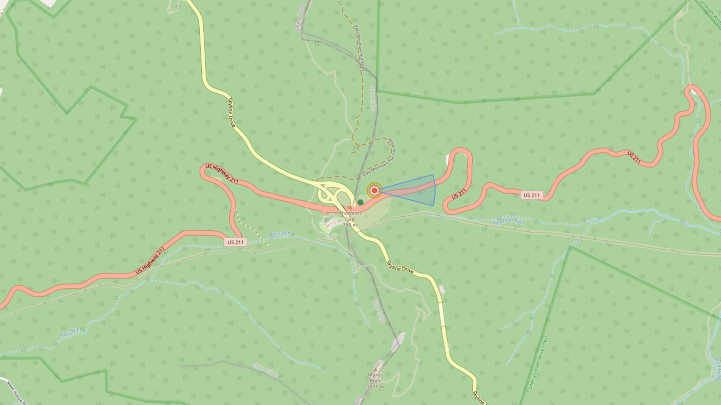 Thornton Gap near US 211 — orange hearing ring and blue downwind smell cone on the OSM woods map.